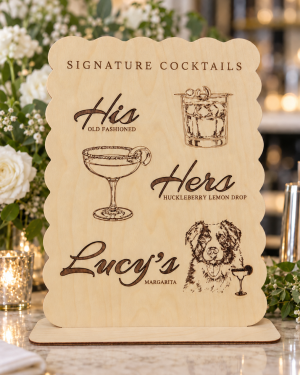 Wooden signature drink sign with pet portrait and scalloped edge on a marble wedding bar