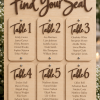 Personalized wedding seating chart with 3D lettering and engraved wood panels
