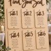 Rustic wood wedding seating chart with personalized couple names and wedding date