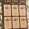 Personalized wooden Find Your Seat wedding seating chart for reception