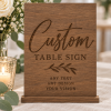 Personalized wooden custom table sign with engraved lettering and stand