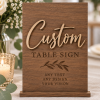 Custom wooden wedding table sign in arch shape with engraved lettering