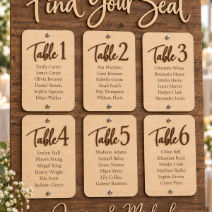 Personalized wood wedding seating chart with engraved guest names and table numbers