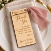 Engraved wooden wedding thank you place cards with personalized guest names and ribbon