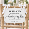 ChatGPT Image Sep 22, 2026, 10_18_03 PM White acrylic reserved memorial chair sign with white ribbon for wedding ceremony