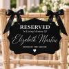 ChatGPT Image Sep 23, 2026, 02_30_10 PM Black acrylic reserved memorial chair sign with black ribbon for wedding ceremony