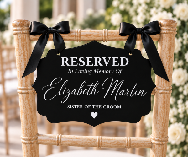 ChatGPT Image Sep 23, 2026, 02_30_10 PM Black acrylic reserved memorial chair sign with black ribbon for wedding ceremony