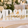 ChatGPT Image Sep 25, 2026, 12_51_34 PM Personalized white acrylic MR and MRS wedding sign with gold mirror last name lettering